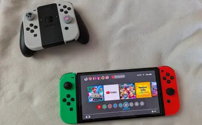 Nintendo Switch OLED (blanche), photo 2 prise par Marwane