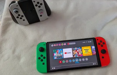 Nintendo Switch OLED (blanche), photo 3 prise par Marwane