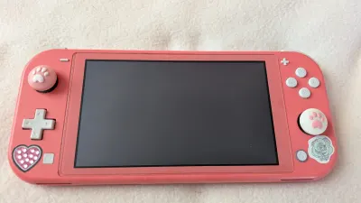 Nintendo Switch Lite (corail), photo prise par Marwane