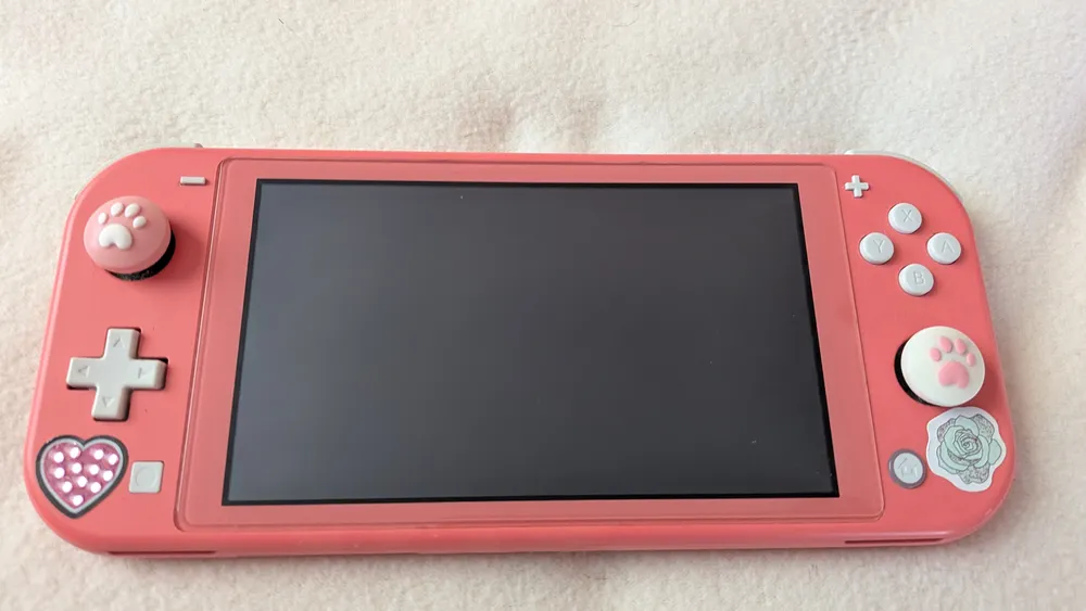 Nintendo Switch Lite (corail), photo 1 prise par Marwane