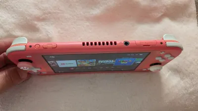 Nintendo Switch Lite (corail), photo 4 prise par Marwane