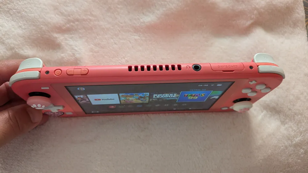 Nintendo Switch Lite (corail), photo 4 prise par Marwane